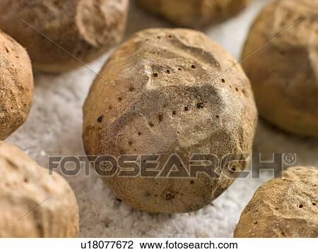 Jacket Potatoes baked on a tray of Sea Salt View Large Photo Image Stock Image - Jacket Potatoes baked on a tray of Sea Salt. Fotosearch
