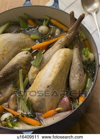 Pot Roasted Guinea Fowl with Spring Vegetables View Large Photo Image Stock Image - Pot Roasted Guinea Fowl with Spring Vegetables. Fotosearch