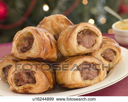 Stock Photo - Sausage Rolls and English Mustard. Fotosearch