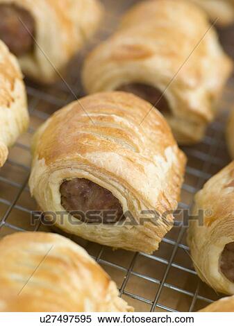 Sausage Rolls on a Cooling Rack View Large Photo Image Stock Photography - Sausage Rolls on a Cooling Rack. Fotosearch