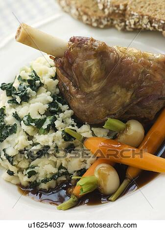 Slow Roasted Spring Lamb Shank with Colcannon and Soda Bread View Large Photo Image Stock Photo - Slow Roasted Spring Lamb Shank with Colcannon and Soda Bread. Fotosearch
