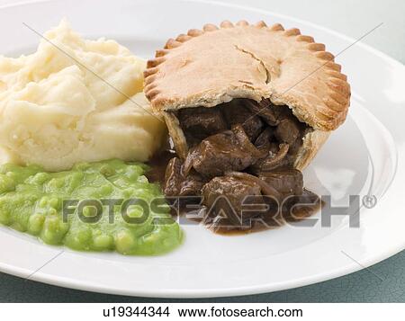 Steak Pie Mash and Mushy Peas View Large Photo Image Picture - Steak Pie Mash and Mushy Peas. Fotosearch