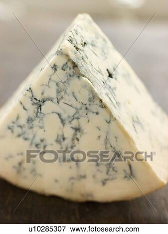 Wedge of English Stilton Cheese View Large Photo Image Stock Photo - Wedge of English Stilton Cheese. Fotosearch