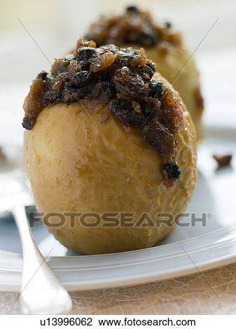 Baked Apples stuffed with Christmas Pudding View Large Photo Image Stock Image - Baked Apples stuffed with Christmas Pudding. Fotosearch