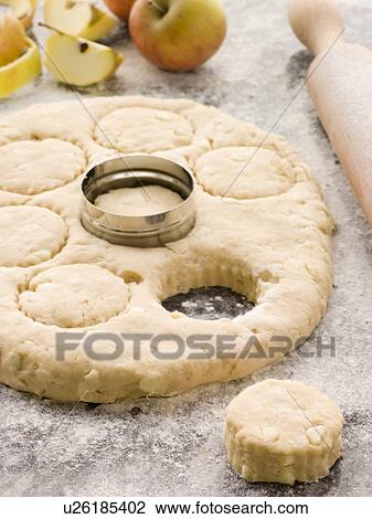 Cutting Apple and Cinnamon Scones View Large Photo Image Stock Image - Cutting Apple and Cinnamon Scones. Fotosearch