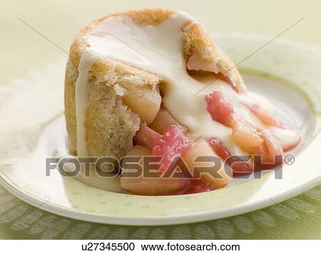 Hot Apple and Rhubarb Charlotte with Custard View Large Photo Image Stock Image - Hot Apple and Rhubarb Charlotte with Custard. Fotosearch
