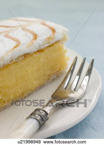 Iced Custard Slice on a plate View Large Photo Image Stock Photo - Iced Custard Slice on a plate. Fotosearch