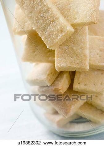 Stock Image - Jar of Shortbread Finger Biscuits. Fotosearch