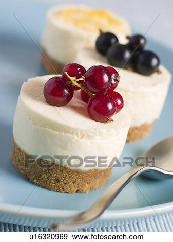 Trio of Individual Cheesecakes View Large Photo Image Stock Photo - Trio of Individual Cheesecakes. Fotosearch