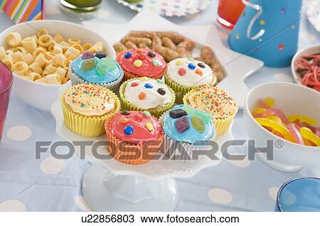 Birthday party table setting with food View Large Photo Image Stock Image - Birthday party table setting with food. Fotosearch
