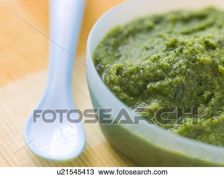 Stock Image - Broccoli and Spinach Baby Food Puree. Fotosearch