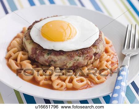 Corned Beef Hash Cake with Alphabet Pasta and a Fried Egg View Large Photo Image Stock Photograph - Corned Beef Hash Cake with Alphabet Pasta and a Fried Egg. Fotosearch