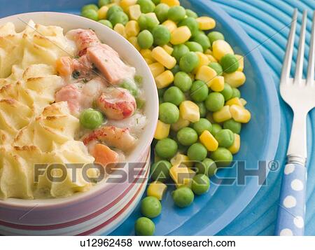Individual Fish Pie with Peas and Sweetcorn View Large Photo Image Stock Photo - Individual Fish Pie with Peas and Sweetcorn. Fotosearch