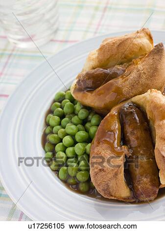 Individual Toad in the Holes with Gravy and Peas View Large Photo Image Stock Photography - Individual Toad in the Holes with Gravy and Peas. Fotosearch
