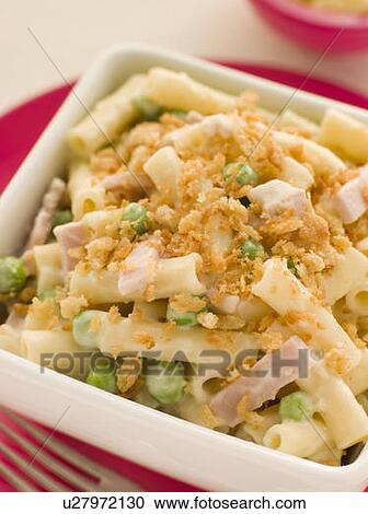 Stock Image - Macaroni Cheese with Peas Ham and a Toasted Crumb. Fotosearch