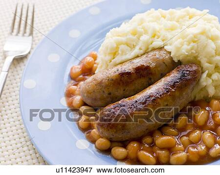 Stock Photo - Sausage and Mash with Baked Beans. Fotosearch