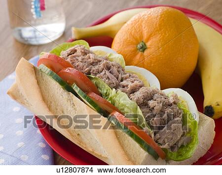 Tuna Egg and Salad Baguette with Fresh Fruit View Large Photo Image Picture - Tuna Egg and Salad Baguette with Fresh Fruit. Fotosearch