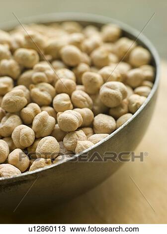 Bowl of uncooked Chickpeas View Large Photo Image Stock Image - Bowl of uncooked Chickpeas. Fotosearch