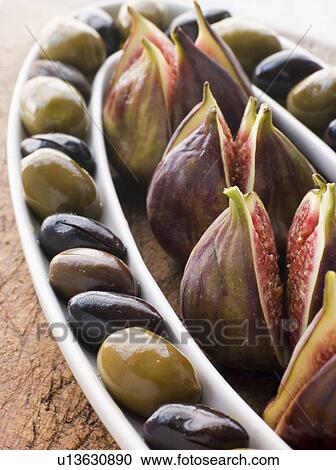 Dish of Green and Black Olives with Fresh Figs View Large Photo Image Stock Image - Dish of Green and Black Olives with Fresh Figs. Fotosearch