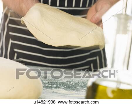 Making a Pizza Base View Large Photo Image Stock Photo - Making a Pizza Base. Fotosearch