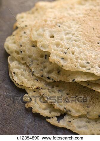 Stock Image - Pile of Dosa. Fotosearch