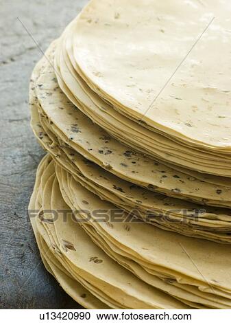 Stack of uncooked Papadoms View Large Photo Image Stock Image - Stack of uncooked Papadoms. Fotosearch