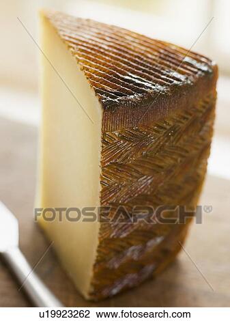 Stock Image - Wedge of Manchego Cheese. Fotosearch