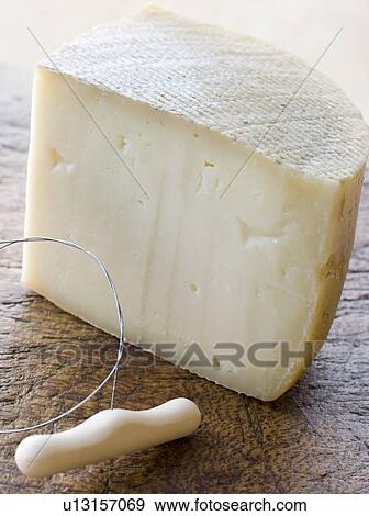 Stock Photo - Wedge of Pecorino Cheese. Fotosearch
