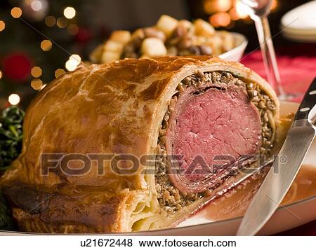 Stock Photo - Carved Beef Wellington. Fotosearch