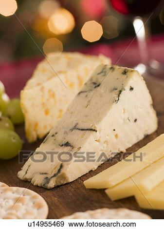 Cheese Board Crackers and Grapes View Large Photo Image Stock Photo - Cheese Board Crackers and Grapes. Fotosearch