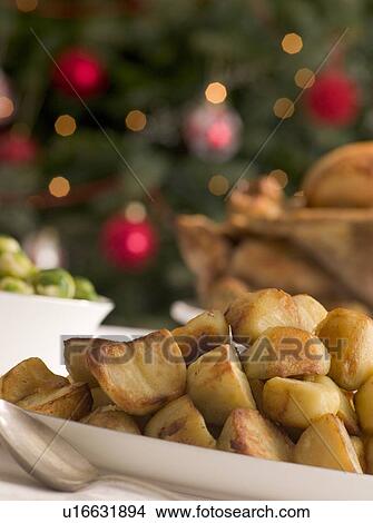 Dish of Roast Potatoes Roast Turkey and Brussel Sprouts View Large Photo Image Picture - Dish of Roast Potatoes Roast Turkey and Brussel Sprouts. Fotosearch