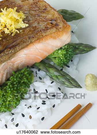 Citrus Salmon Fillet on Rice Steamed Vegetables with Sesame and Wasabi View Large Photo Image Stock Image - Citrus Salmon Fillet on Rice Steamed Vegetables with Sesame and Wasabi. Fotosearch