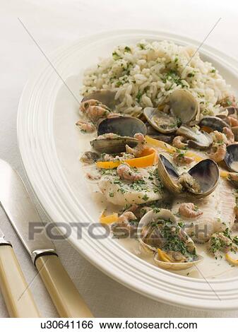 Stock Photograph - Dover Sole 'Normande' with Herb Rice. Fotosearch