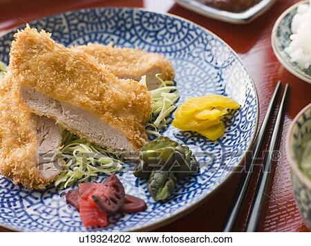 Stock Image - Miso Soup Cup and Spoon. Fotosearch