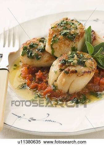 Stock Photography - Pan Fried Scallops Piperade and Garlic Butter. Fotosearch