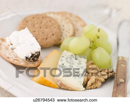 Stock Image - Plate of Cheese and Biscuits. Fotosearch