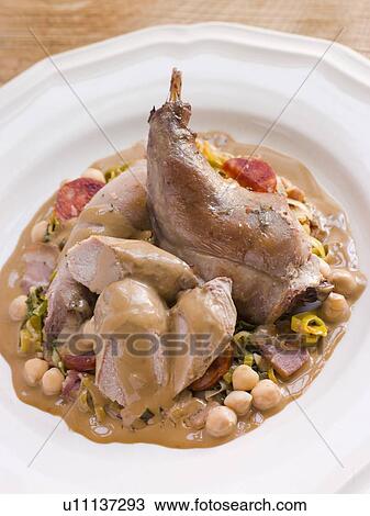 Roasted Rabbit with Chickpeas and Cabrales Sauce View Large Photo Image Stock Image - Roasted Rabbit with Chickpeas and Cabrales Sauce. Fotosearch