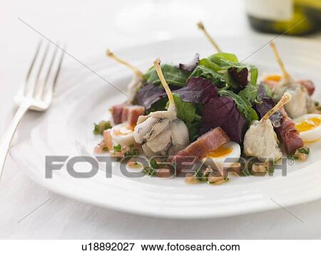 Salad of Frog Legs Lardons and Quail Eggs View Large Photo Image Stock Photo - Salad of Frog Legs Lardons and Quail Eggs. Fotosearch