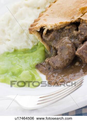 Steak Pie and Mash with Mushy Peas View Large Photo Image Stock Photograph - Steak Pie and Mash with Mushy Peas. Fotosearch