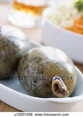 Whole Haggis with Neeps Tatties and Whiskey View Large Photo Image Stock Photo - Whole Haggis with Neeps Tatties and Whiskey. Fotosearch