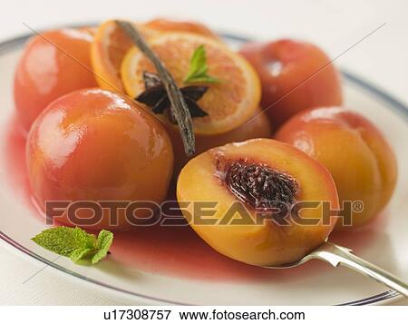 Stock Photo - Bowl of Peaches Poached in Sauternes Wine. Fotosearch