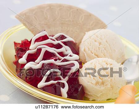 Stock Photograph - Jelly and Ice Cream with a Wafer and Cream. Fotosearch