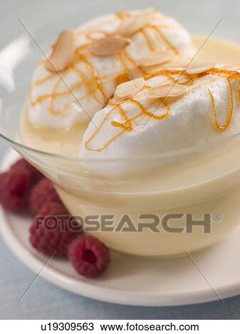 Stock Image - Oeuf a la Neige - Snow Eggs - Floating Islands. Fotosearch