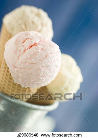 Stock Photo - Trio Of Ice Creams in Wafer Cones. Fotosearch