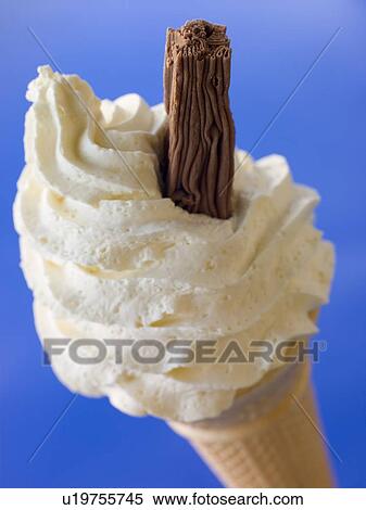 Stock Photography - Whipped Ice Cream Cone with a Chocolate Flake. Fotosearch