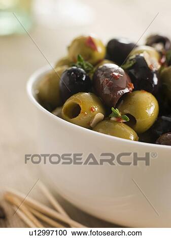 Bowl of Chilli and Garlic Marinated Olives View Large Photo Image Stock Image - Bowl of Chilli and Garlic Marinated Olives. Fotosearch