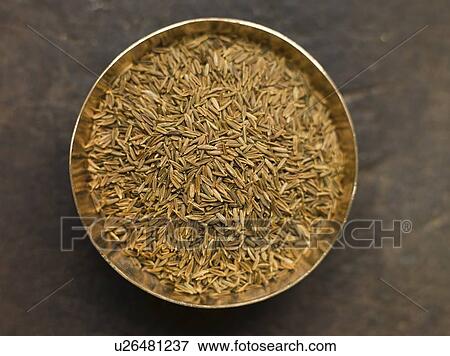Stock Photo - Dish of Cumin Seeds. Fotosearch