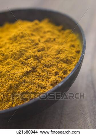 Dish of Ground Dried Turmeric View Large Photo Image Picture - Dish of Ground Dried Turmeric. Fotosearch