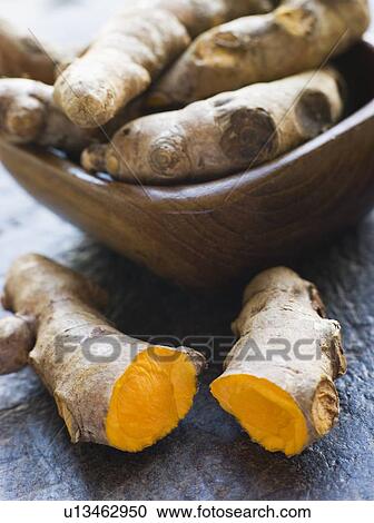 Pieces of Whole And Cracked Fresh Turmeric Root View Large Photo Image Stock Image - Pieces of Whole And Cracked Fresh Turmeric Root. Fotosearch