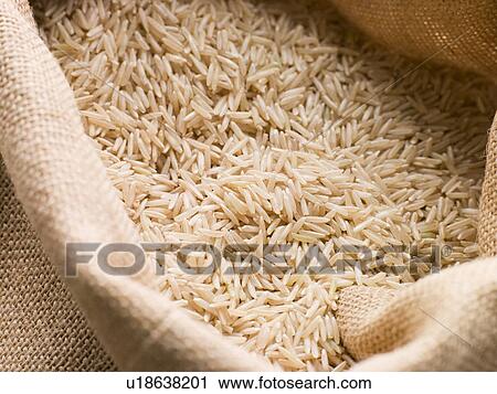 Stock Image - Basmati rice in sack. Fotosearch